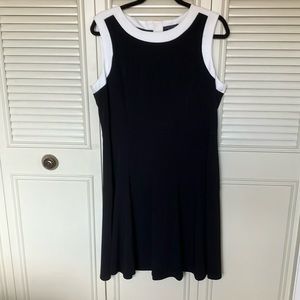 Smart black dress with the white neckline looks beautiful on!
